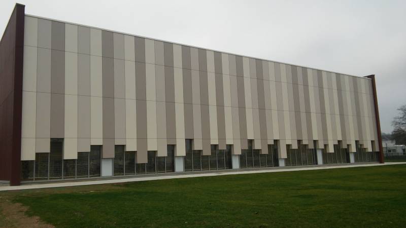 Gallis - Gymnase de la Cerisaie - Façades en panneaux Trespa à ELBEUF 76.